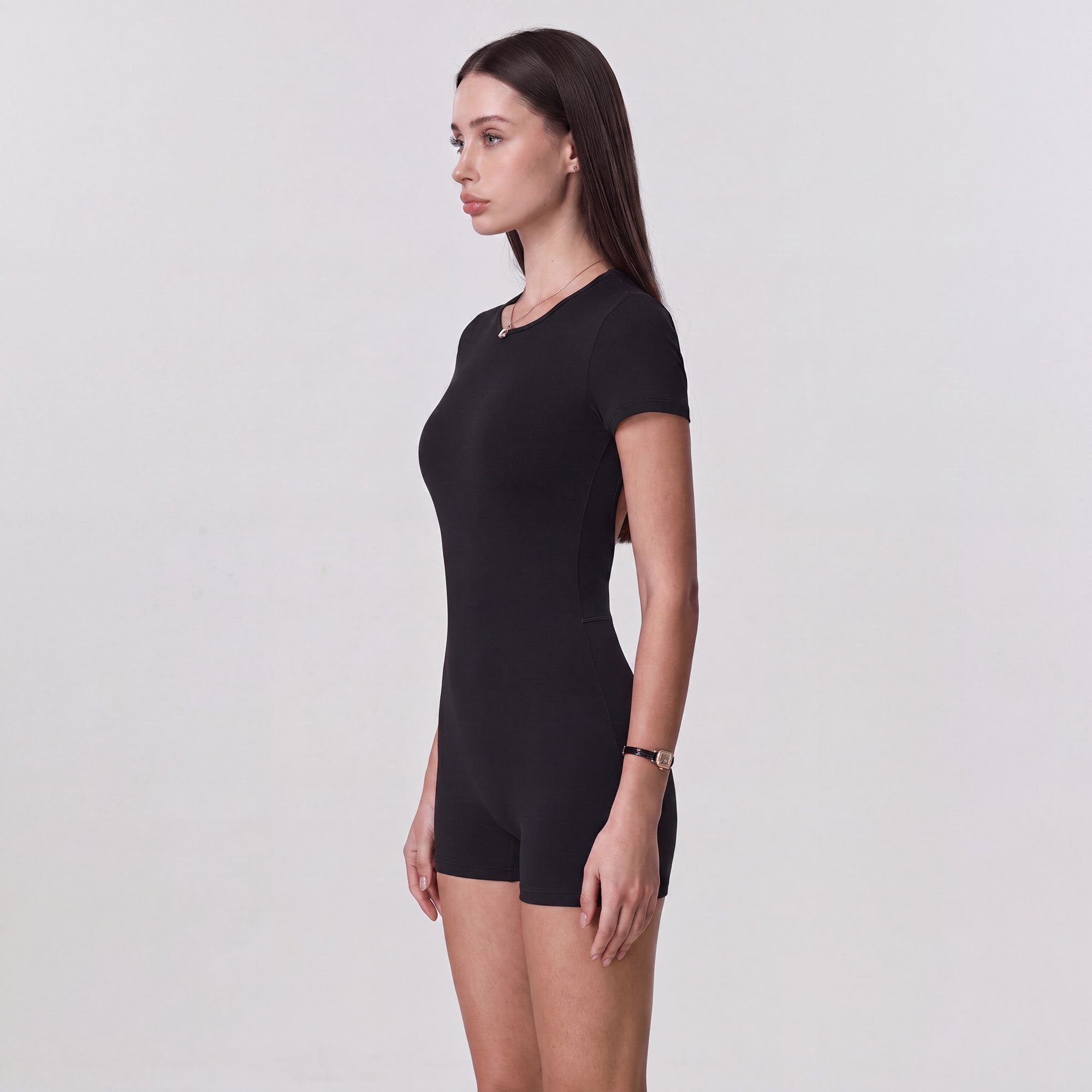 Short Sleeve One Piece Active Romper with Crew Neck Built In Padding Fitted Shorts and Smooth Stretch Fabric