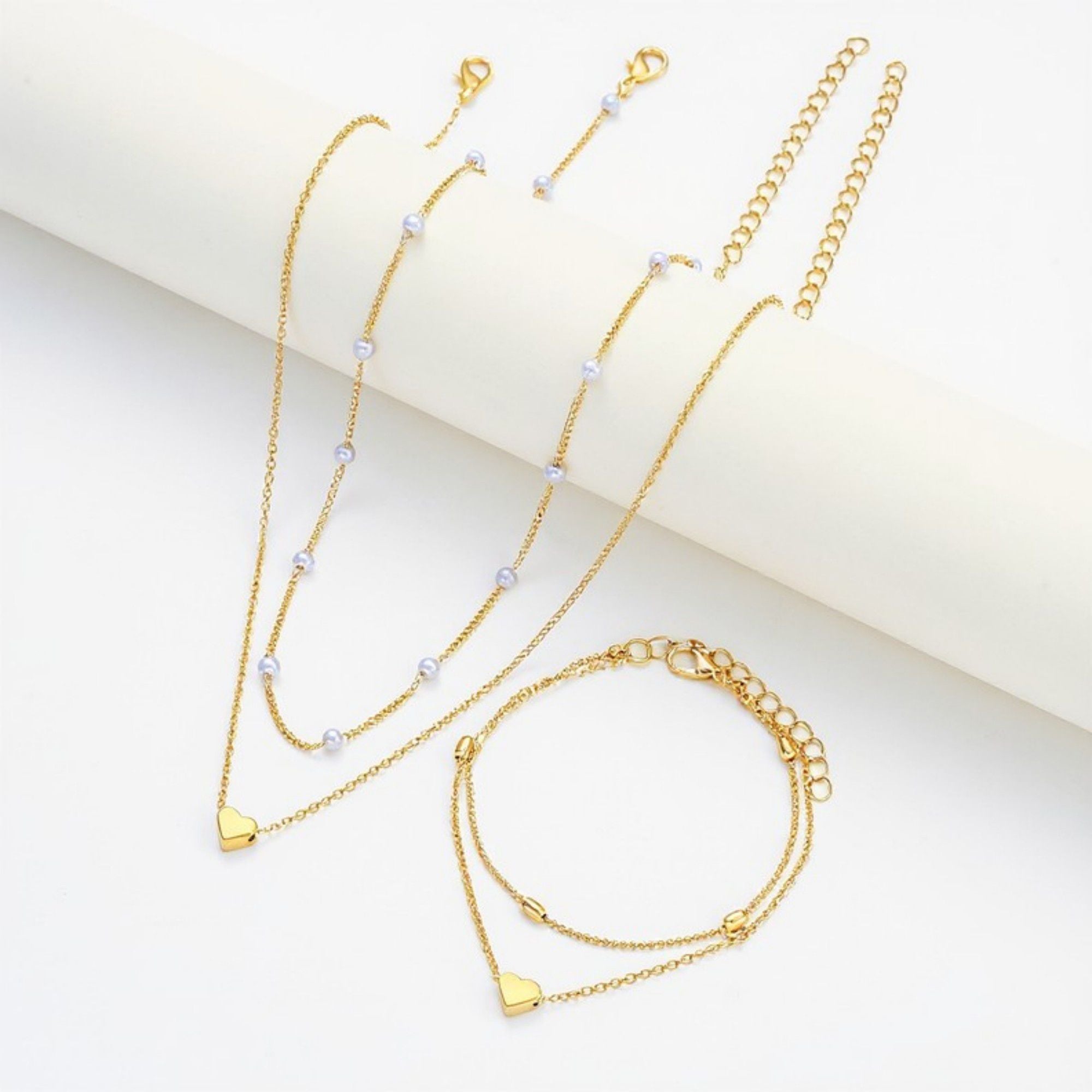 Women's Layered Necklace and Bracelet Set with Heart Charms and Pearl Accents