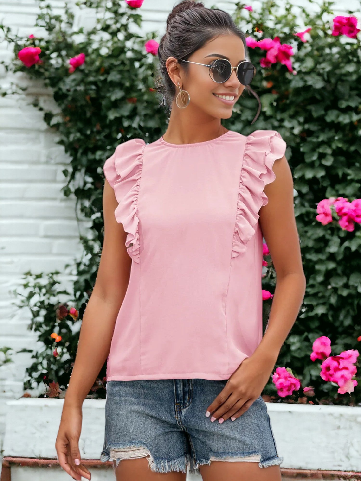 Blusa sin mangas con volantes y espalda abierta