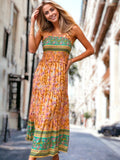 Vestido bohemio con capas y detalle de volantes 