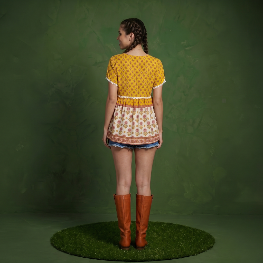 Blusa bohemia con flores y ribetes de crochet