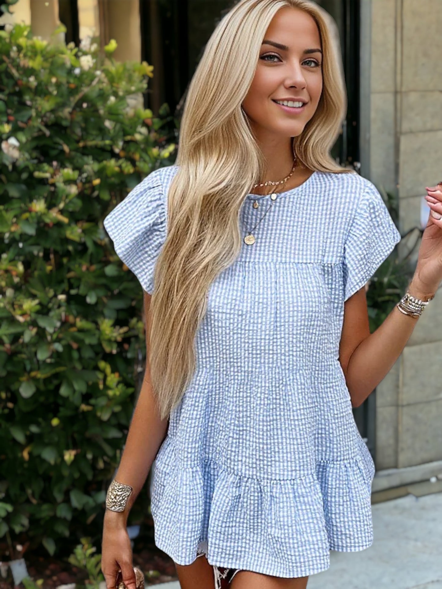 Blusa babydoll texturizada con mangas abullonadas y dobladillo con volantes