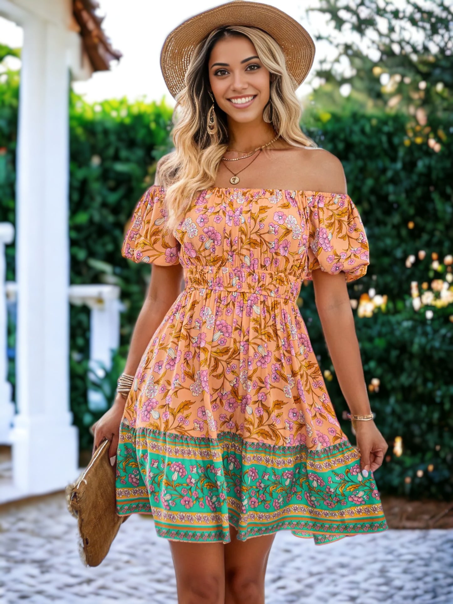 Vestido acampanado con hombros abullonados y estampado floral bohemio