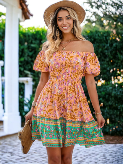 Vestido acampanado con hombros abullonados y estampado floral bohemio