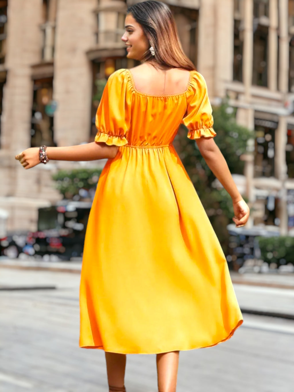 Vestido midi con mangas abullonadas y lazo en la parte delantera