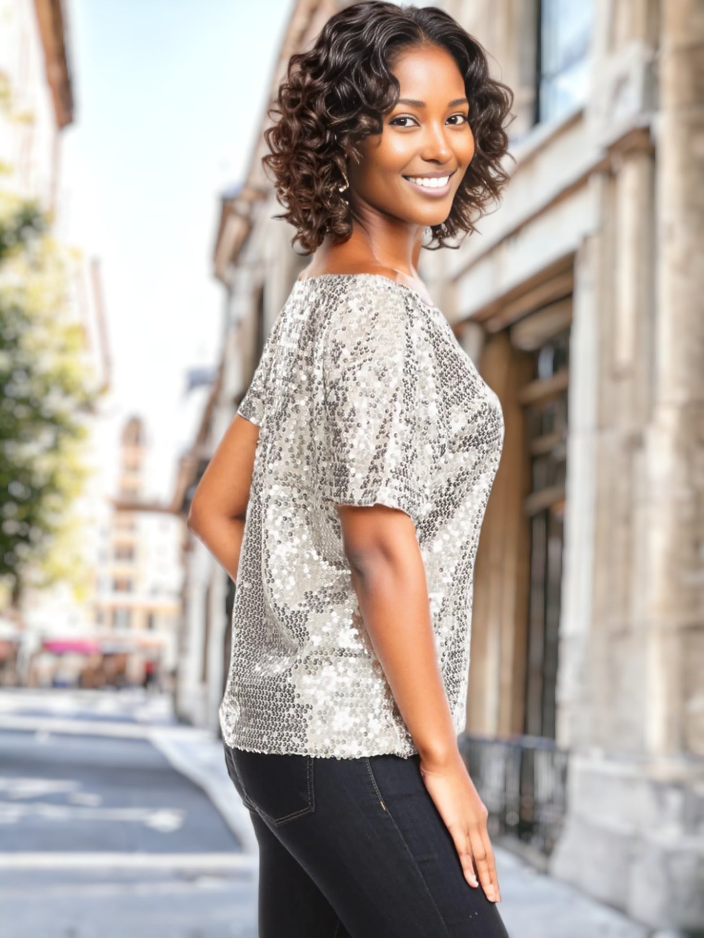 Blusa de lentejuelas con mangas cortas y un hombro