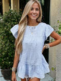 Blusa babydoll texturizada con mangas abullonadas y dobladillo con volantes