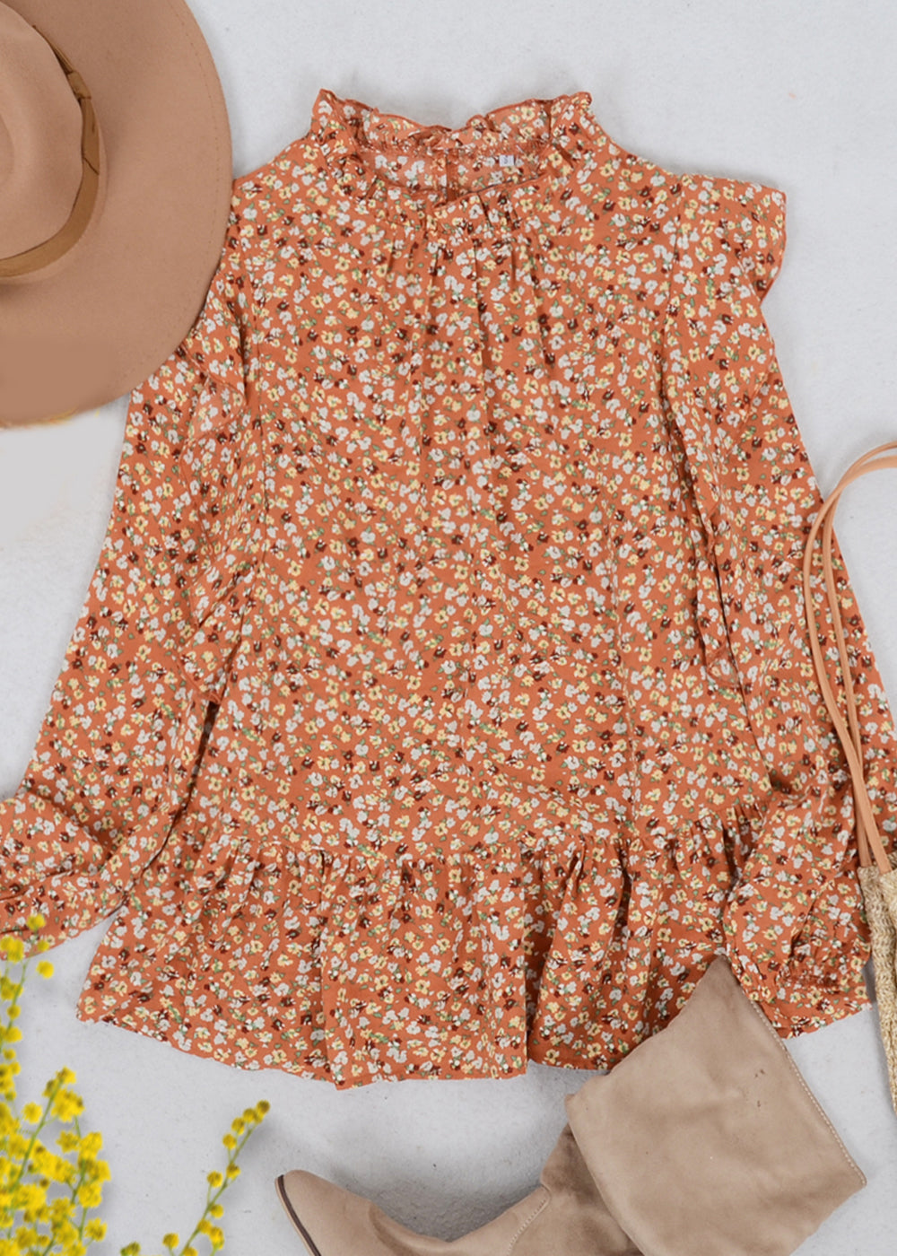 Blusa con estampado floral y detalle de volantes por todas partes