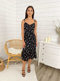 Vestido midi con tiras y lazo con estampado floral negro 