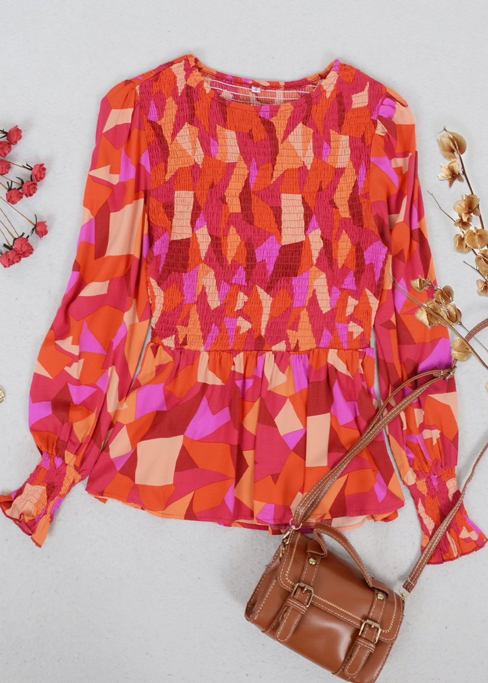 Blusa peplum con estampado floral fruncido