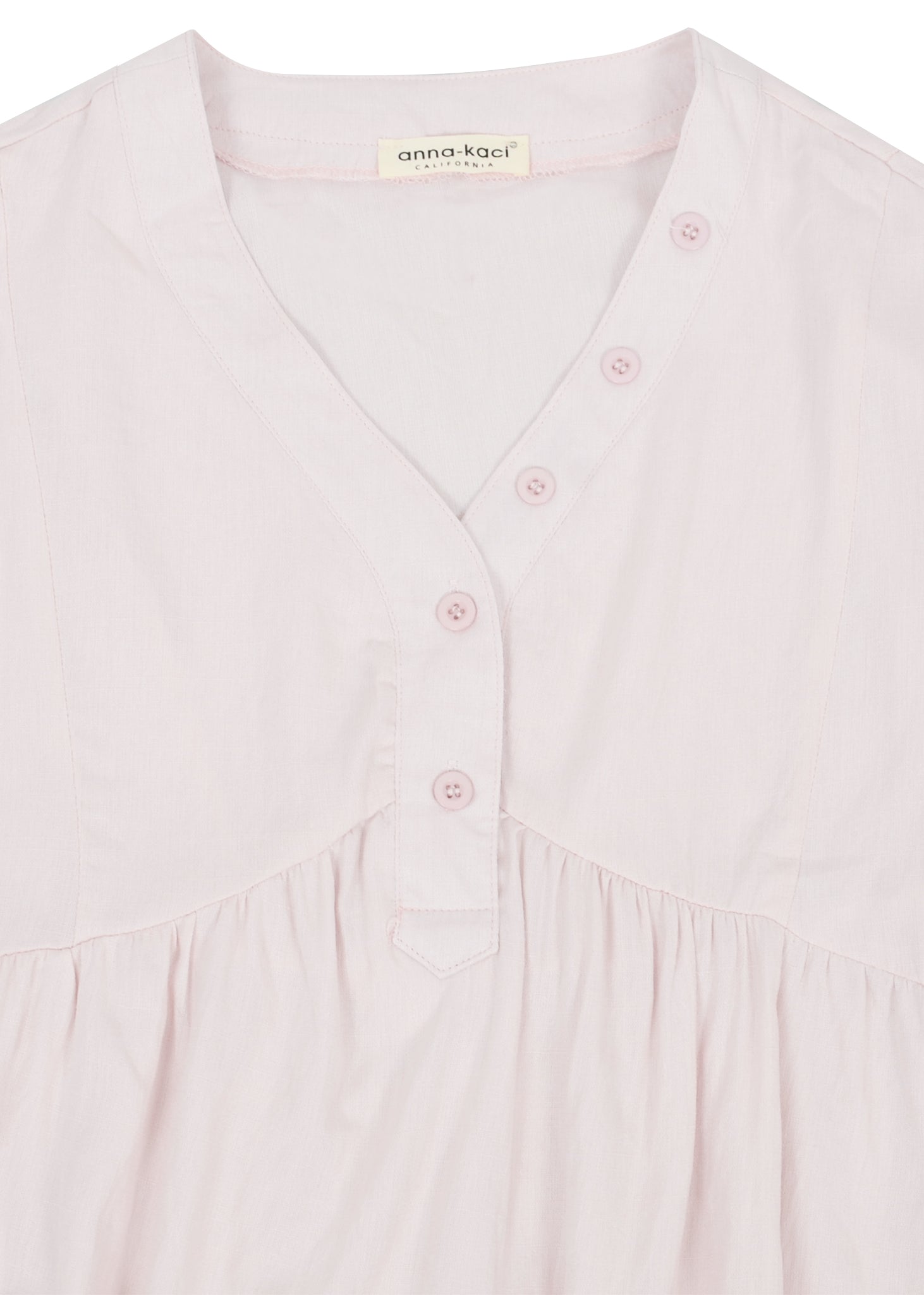 Blusa lisa con detalle de botones 