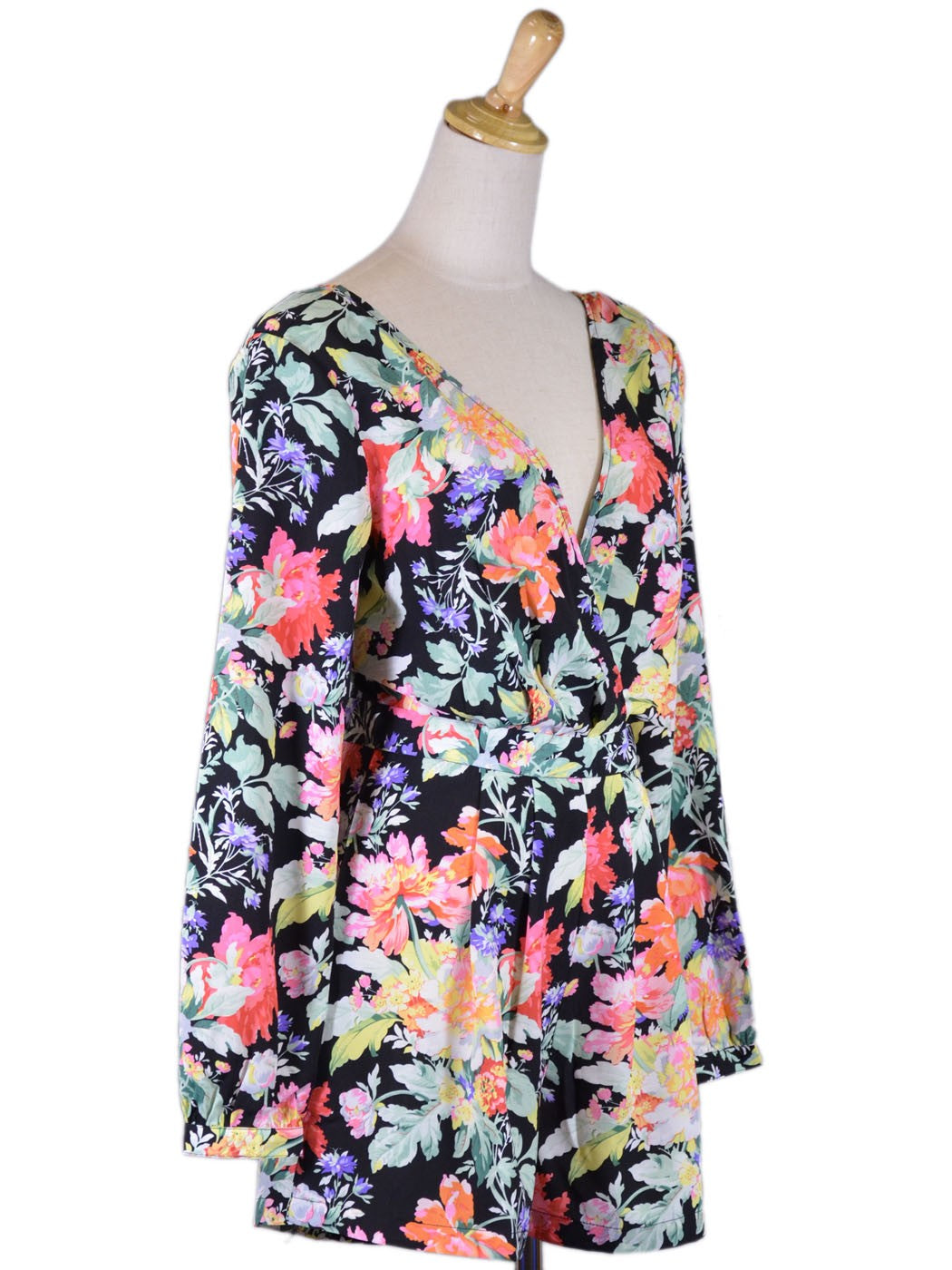 Mono tejido de manga larga con hombros acolchados y estampado floral impresionante de Uniq Beauteous