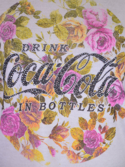 Top de punto sin mangas con cuello redondo y logo de Coca-Cola con estampado floral clásico e informal Sunset