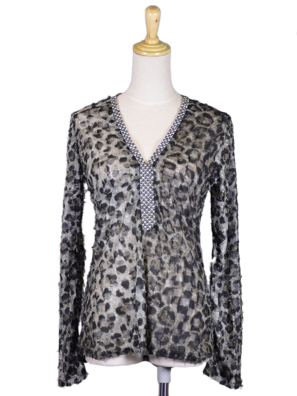 Top Uniq con escote brillante y mangas largas con estampado de malla animalística y tejido desgastado
