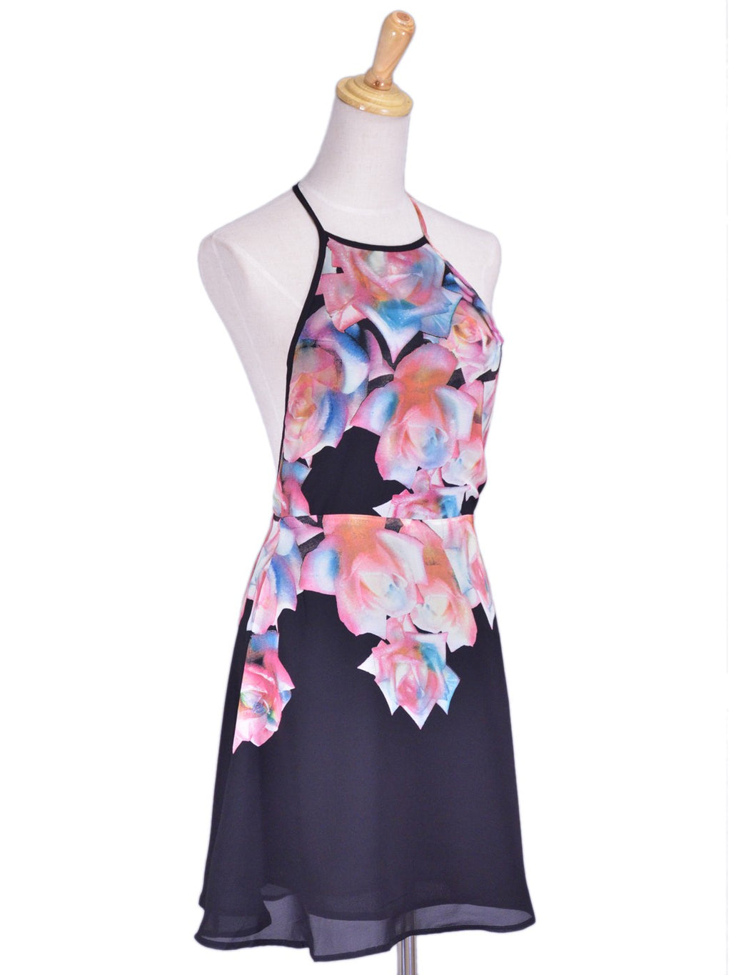Vestido de gasa con espalda descubierta y cuello halter con rosas abstractas en color rosa y negro de la marca Cotton Candy