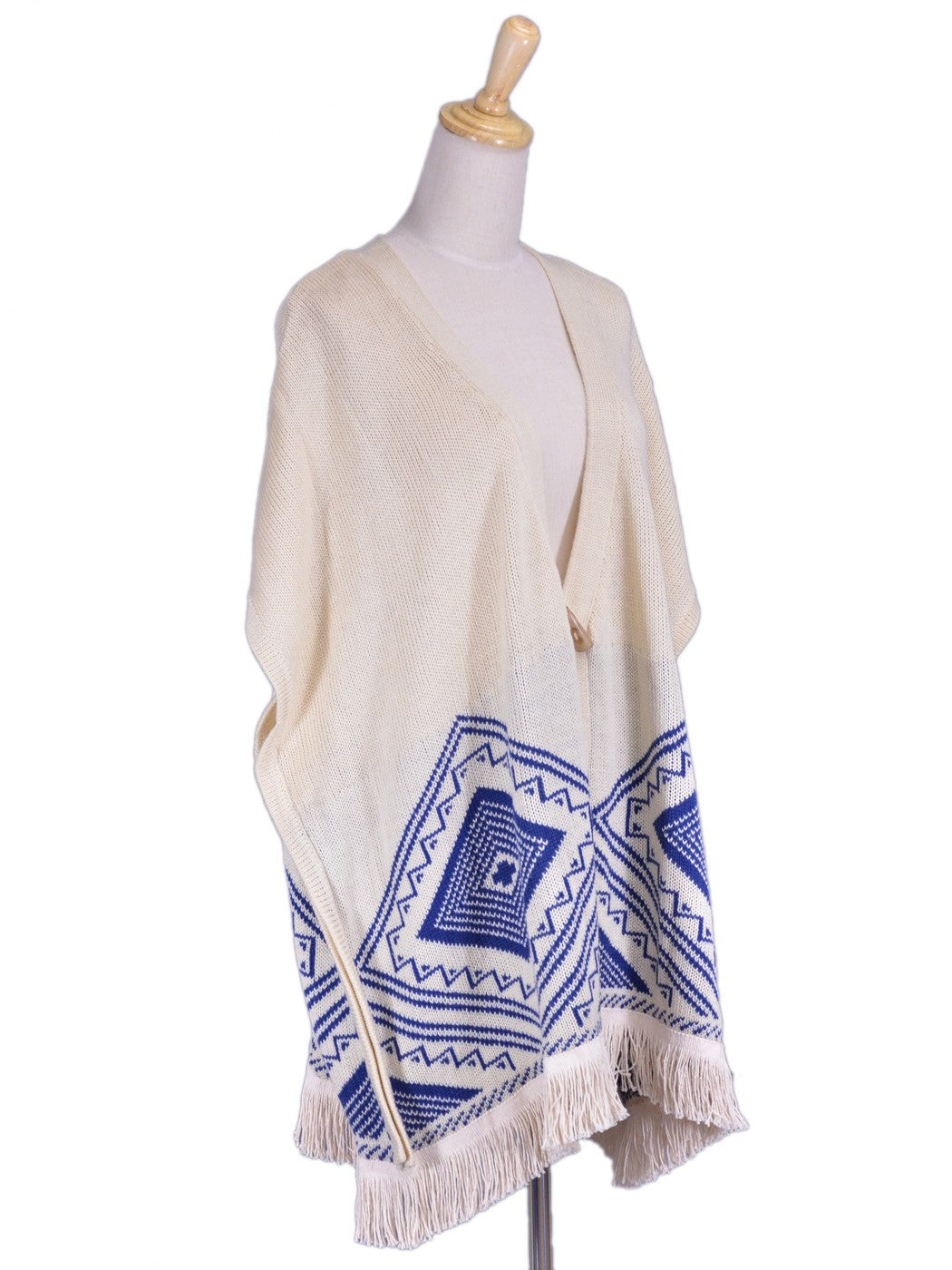 Poncho grande con flecos y espalda bordada con diseño tribal azteca de la marca Pink Owl