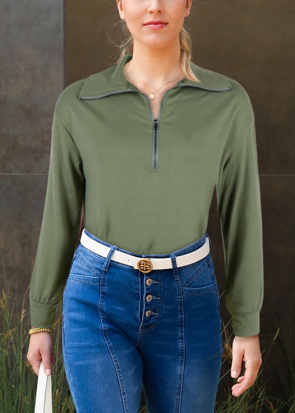 Suéter con cuello alto y cremallera