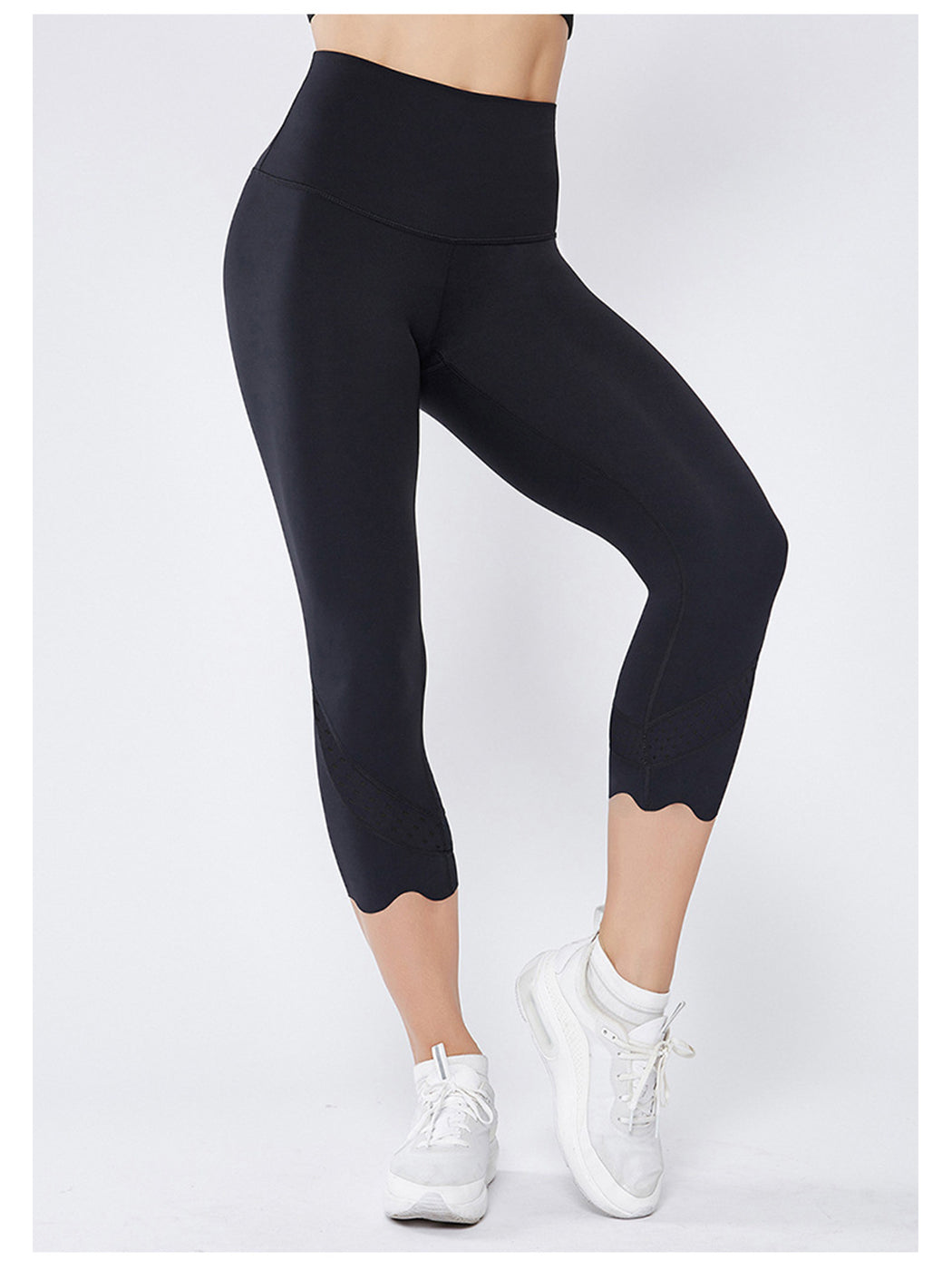 Pantalones de yoga festoneados diseñados con láser
