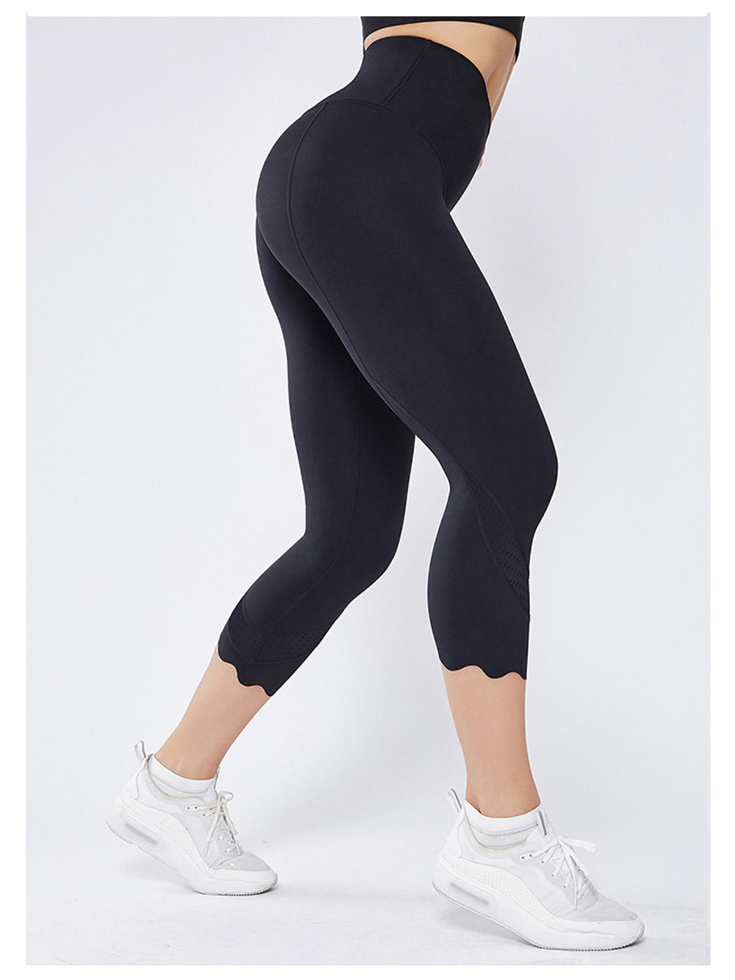 Pantalones de yoga festoneados diseñados con láser