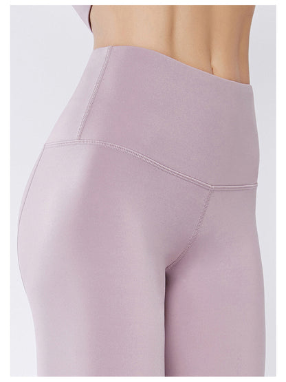 Pantalones de yoga festoneados diseñados con láser
