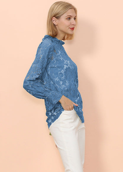 Blusa transparente con mangas abullonadas y encaje en capas