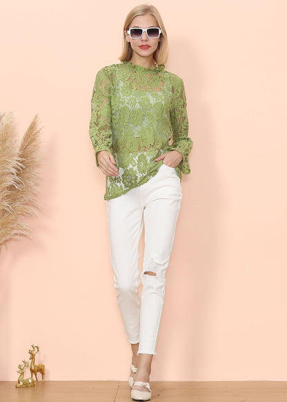 Blusa transparente con mangas abullonadas y encaje en capas