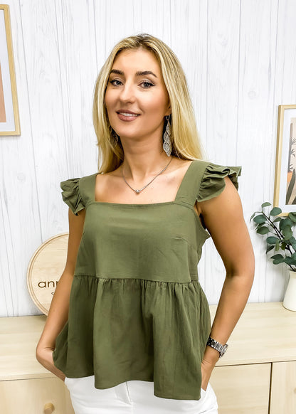Blusa ligera con peplum y volantes