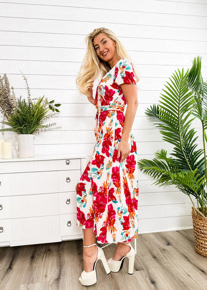 Vestido cruzado de lujo con estampado floral 