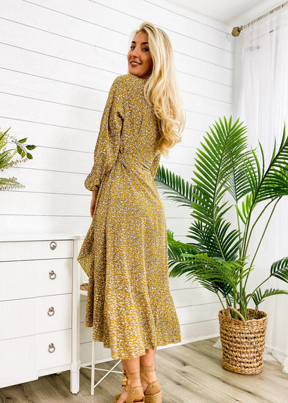 Vestido midi cruzado con estampado floral 