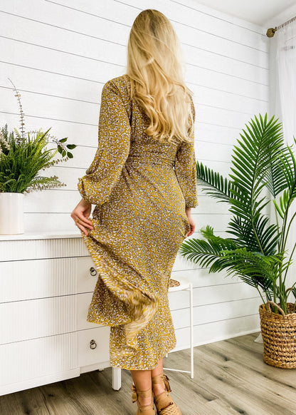 Vestido midi cruzado con estampado floral 