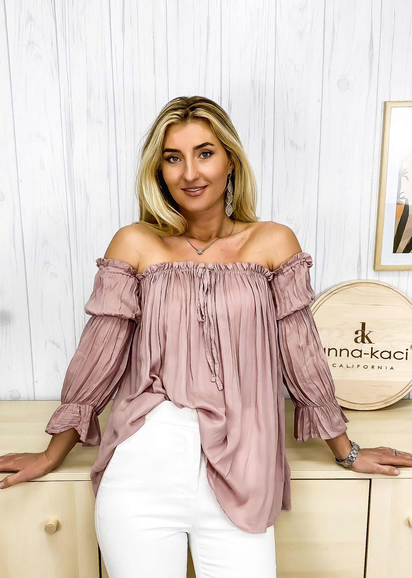 Blusa estilo bohemio semitransparente con hombros descubiertos