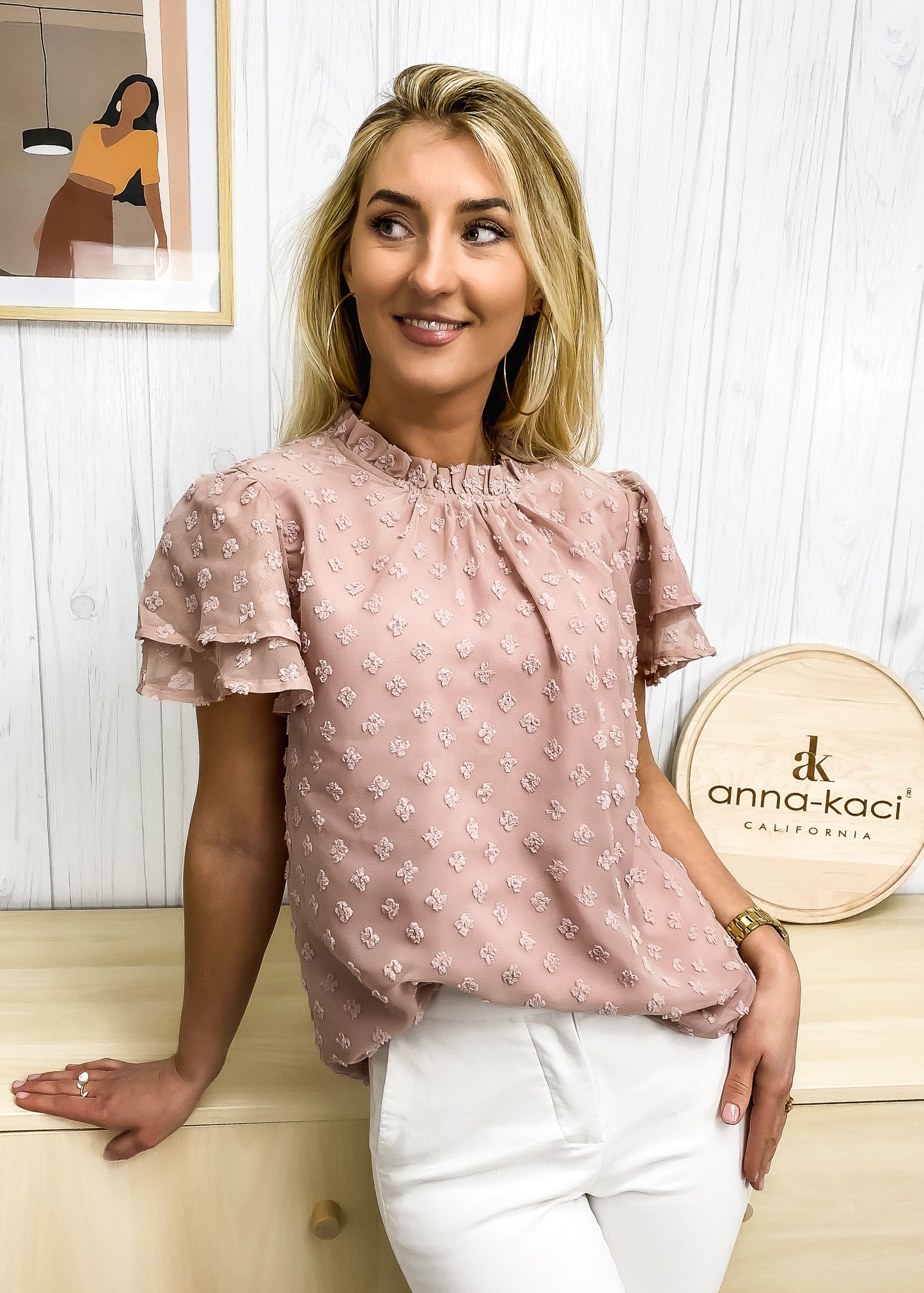 Blusa texturizada con mangas escalonadas