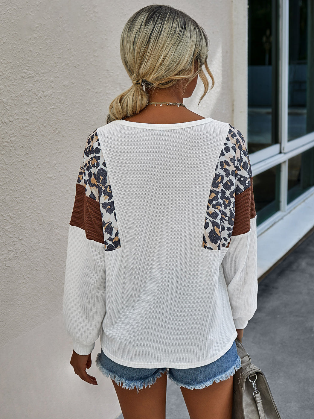 Suéter de punto con estampado de leopardo