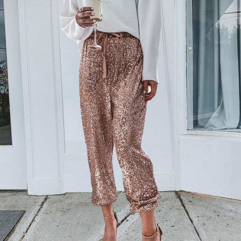 Pantalones deportivos con cordón y lentejuelas 