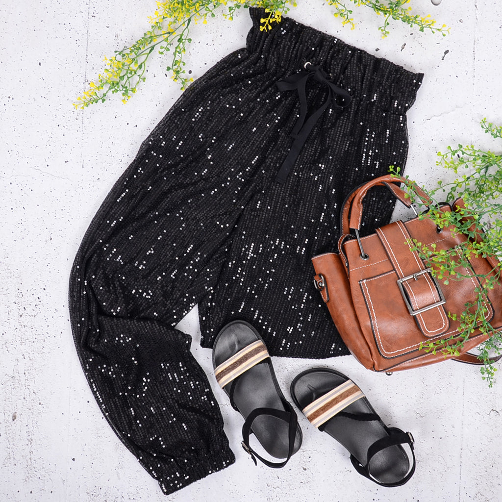 Pantalones deportivos con cordón y lentejuelas 