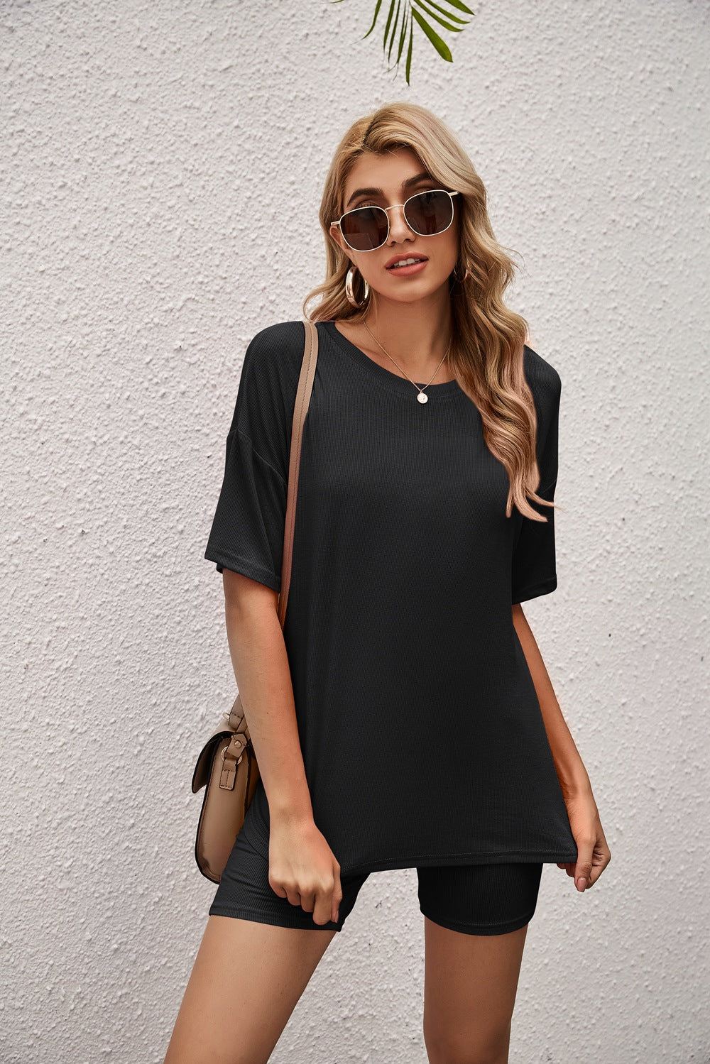 Conjunto de camiseta y pantalones cortos de ciclista de color liso 