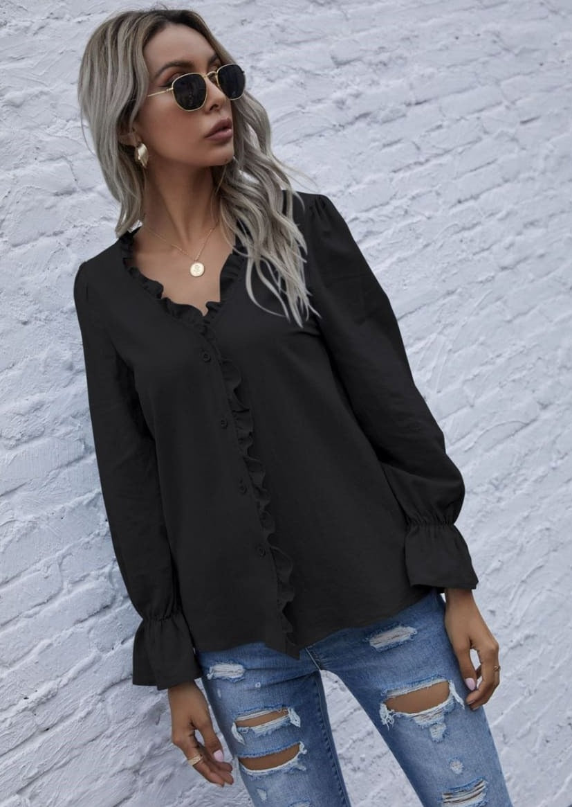 Blusa con botones y ribete de volantes