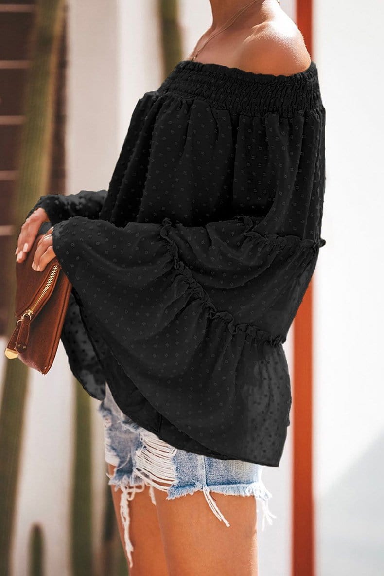 Blusa con volantes y hombros descubiertos