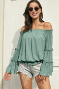 Blusa con volantes y hombros descubiertos