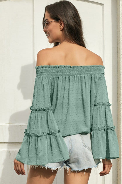 Blusa con volantes y hombros descubiertos