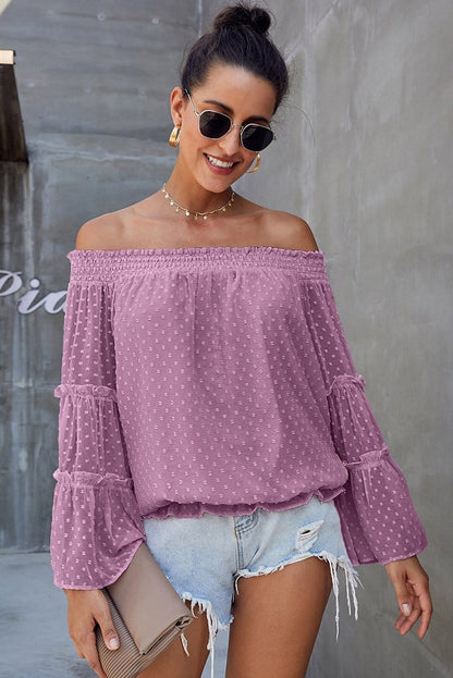 Blusa con volantes y hombros descubiertos