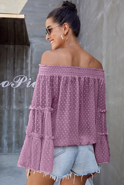 Blusa con volantes y hombros descubiertos