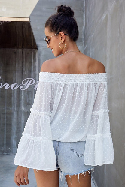 Blusa con volantes y hombros descubiertos