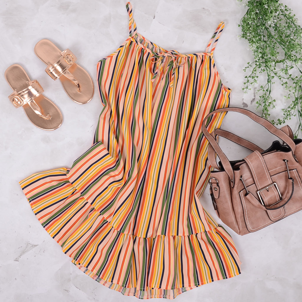 Vestido túnica con volantes y rayas