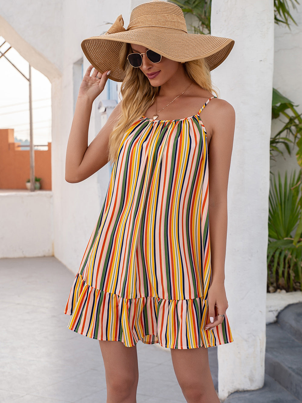 Vestido túnica con volantes y rayas