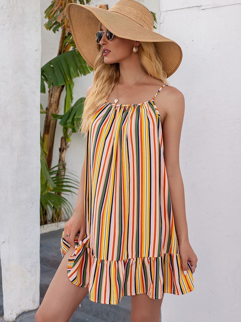 Vestido túnica con volantes y rayas