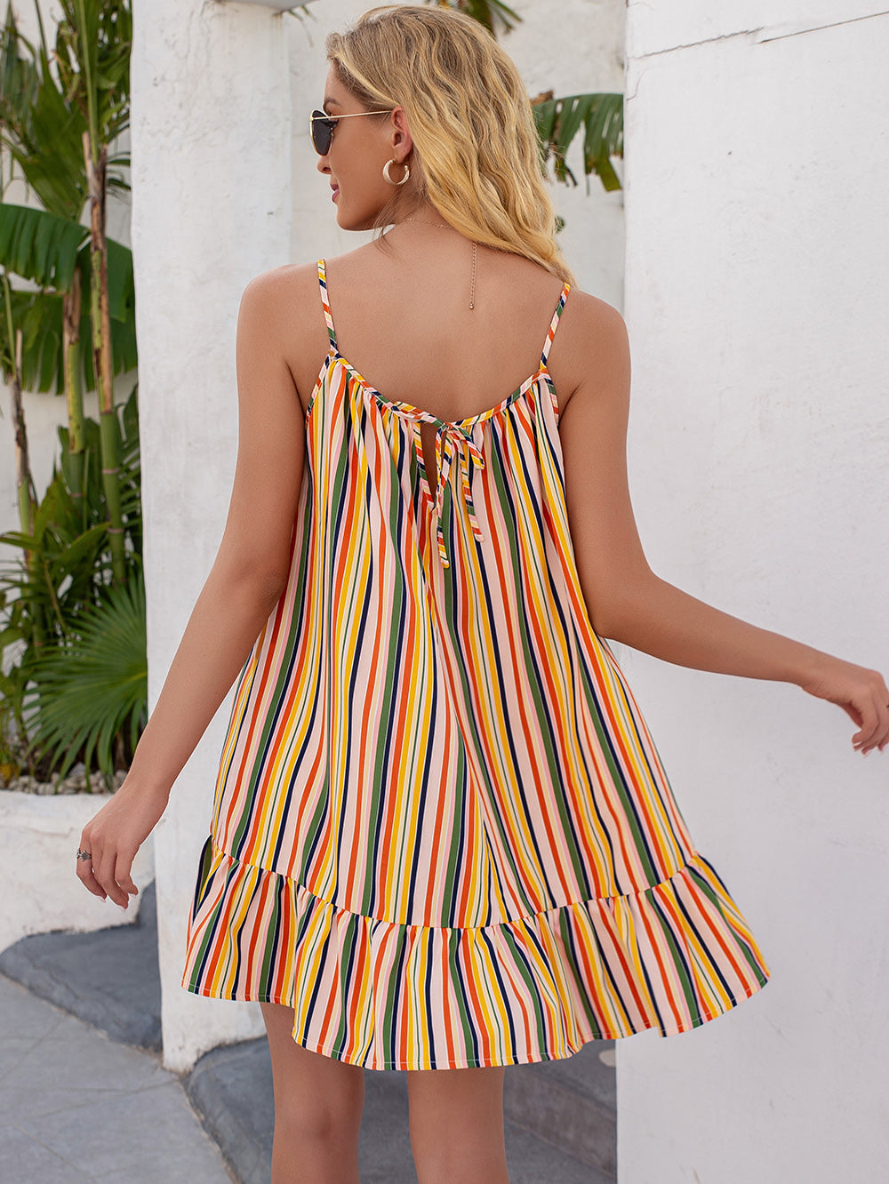 Vestido túnica con volantes y rayas