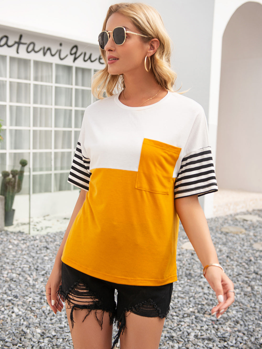 Camiseta de rayas con bloques de color
