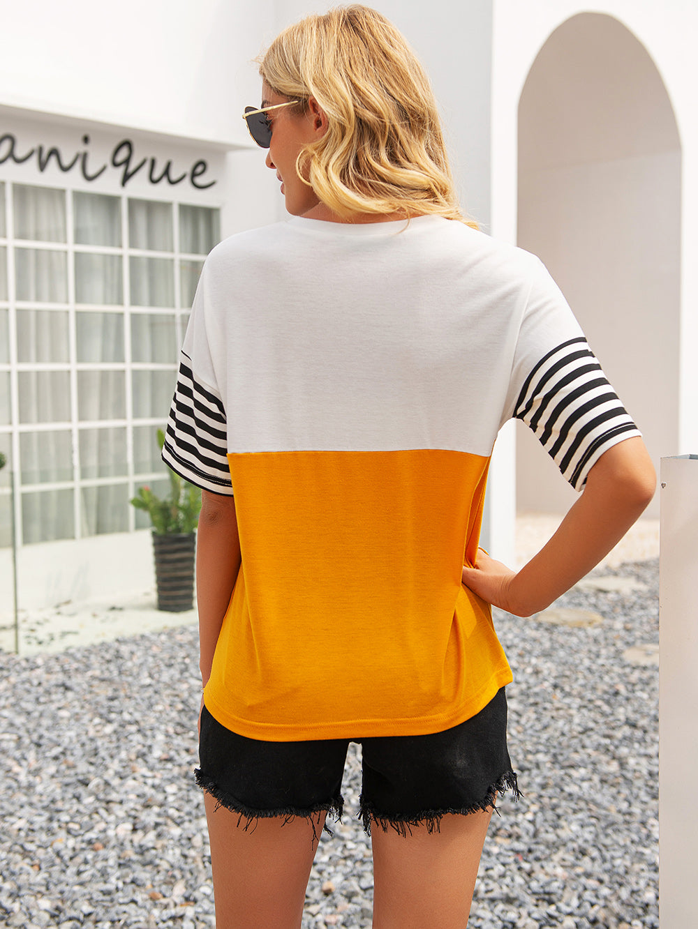 Camiseta de rayas con bloques de color