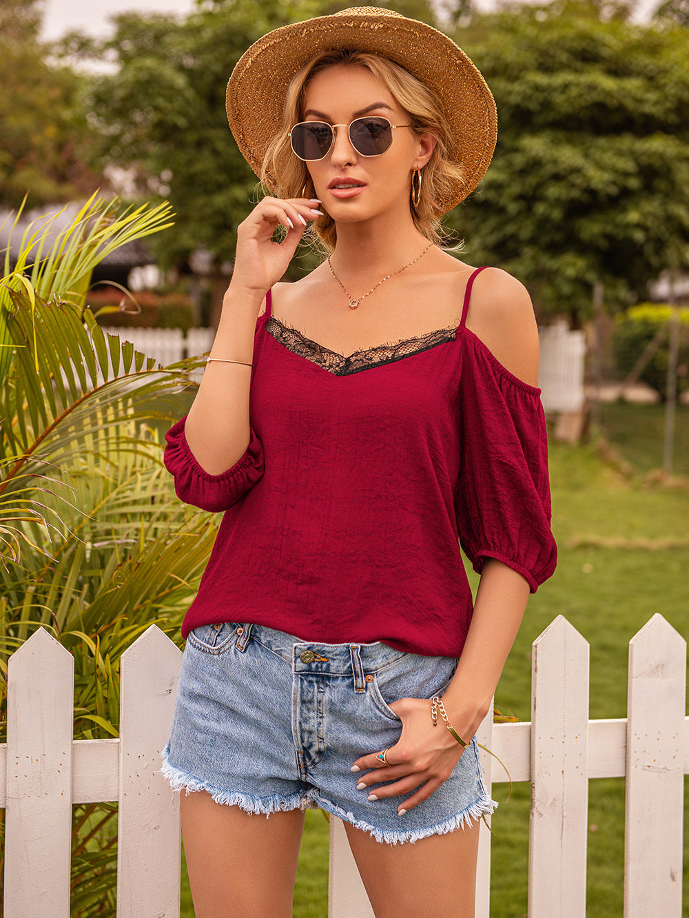 Camisola de encaje con mangas abullonadas